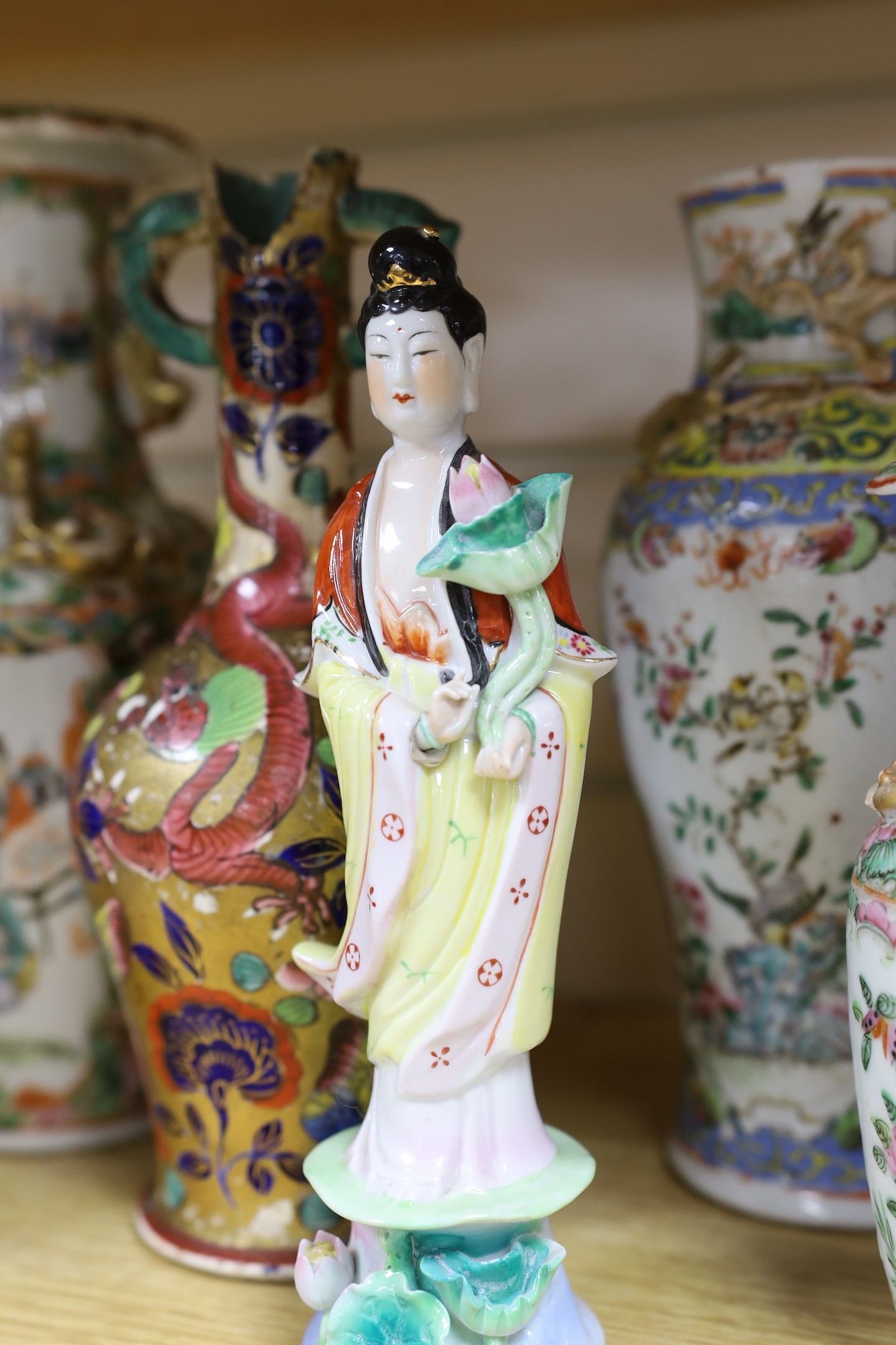 A group of 19th / 20th century Chinese vases and a figure of Guanyin, tallest 25cm